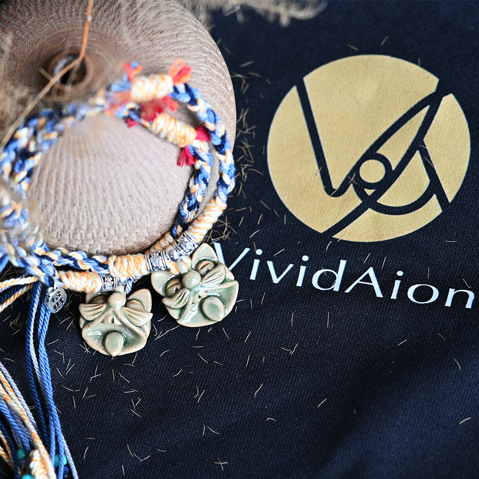 Verdant Wood ceramic WaMao bracelet by VividAion, handcrafted with natural green tones and braided cord, symbolizing vitality and protection.