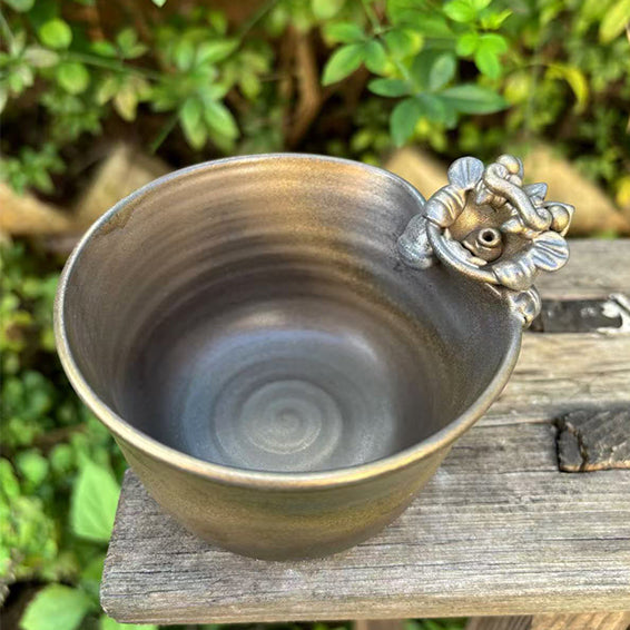 Bronze-hued WaMao cat cup by VividAion, representing grounded elegance and traditional ceramic warmth.