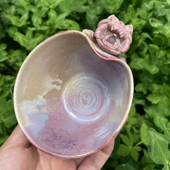 Pink cat cup from VividAion’s WaMao series, handcrafted ceramic design symbolizing affection and playful spirit.