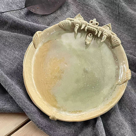 Sky-blue WaMao cat ceramic plate by VividAion, soft glaze blending tranquility with guardian charm.