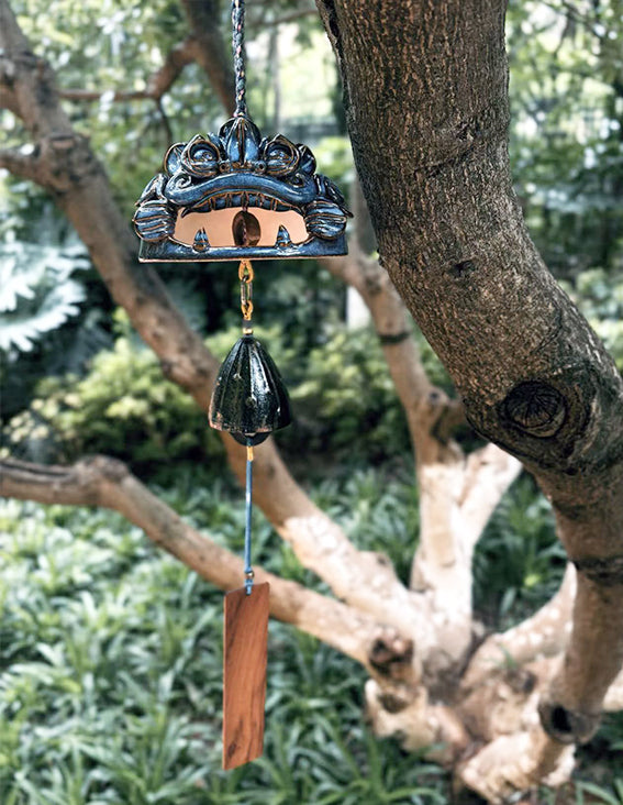 Handcrafted azure WaMao ceramic wind chime by VividAion, echoing Tile Cat guardian mythology for serenity and protection.