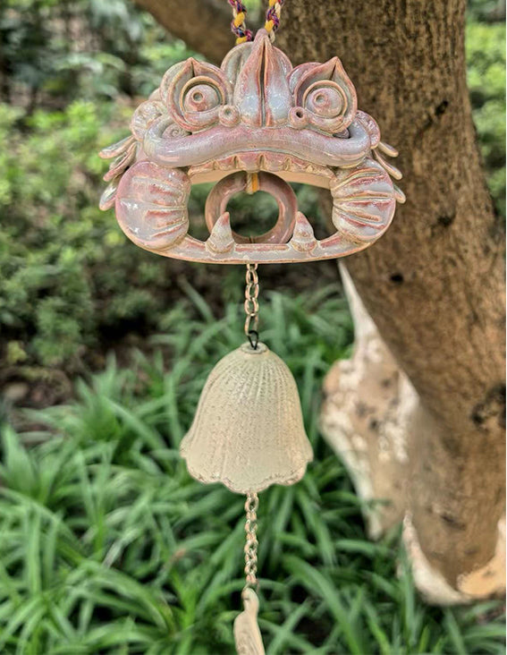 Pink WaMao ceramic wind chime by VividAion, handcrafted to bring gentle sound and guardian peace to any home.