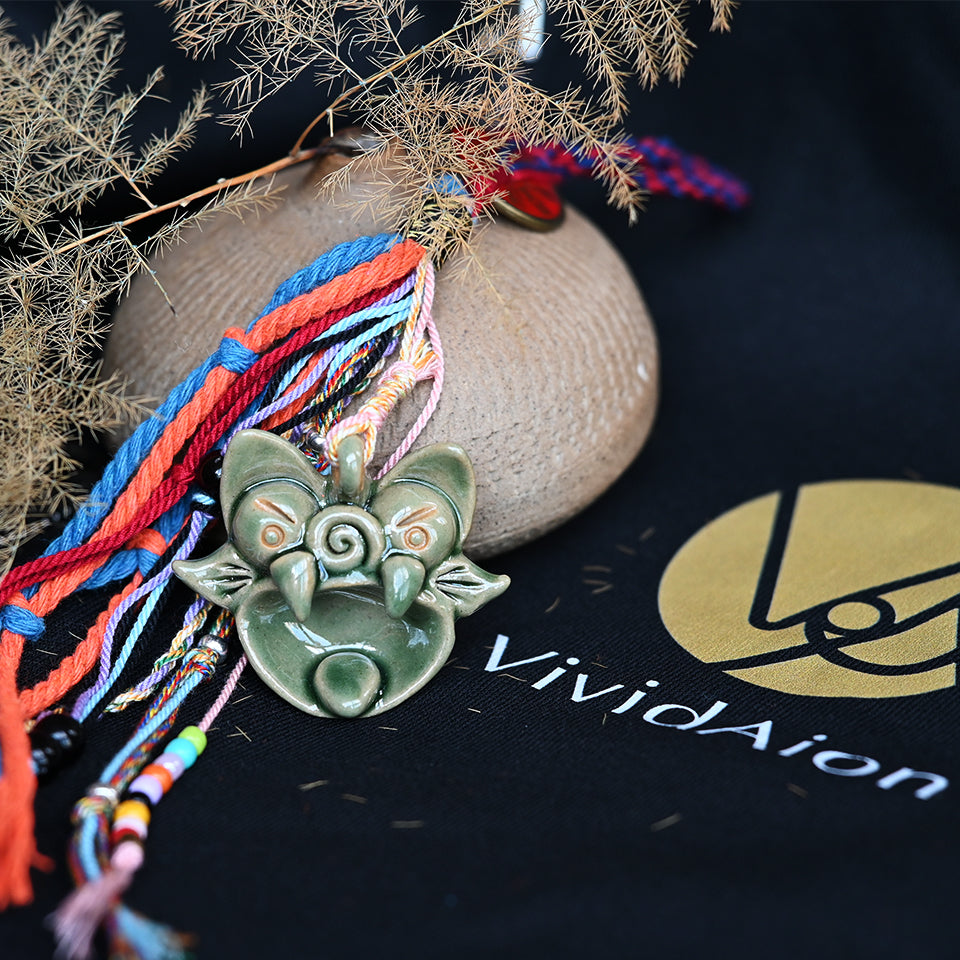 Verdant Wood ceramic guardian ornament, handmade with natural green hues, inspired by the traditional Tile Cat (WaMao) protective spirit.