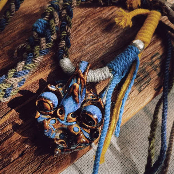 Azure WaMao pendant necklace (Style B) by VividAion Liang Yu, handcrafted ceramic amulet symbolizing harmony and guardian blessing.