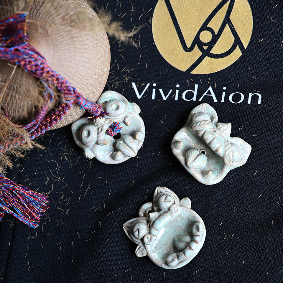 Patterns of Cloud Breath crystalline glaze WaMao pendant, handmade with sky-blue and white crystalline effects, echoing air and serenity.