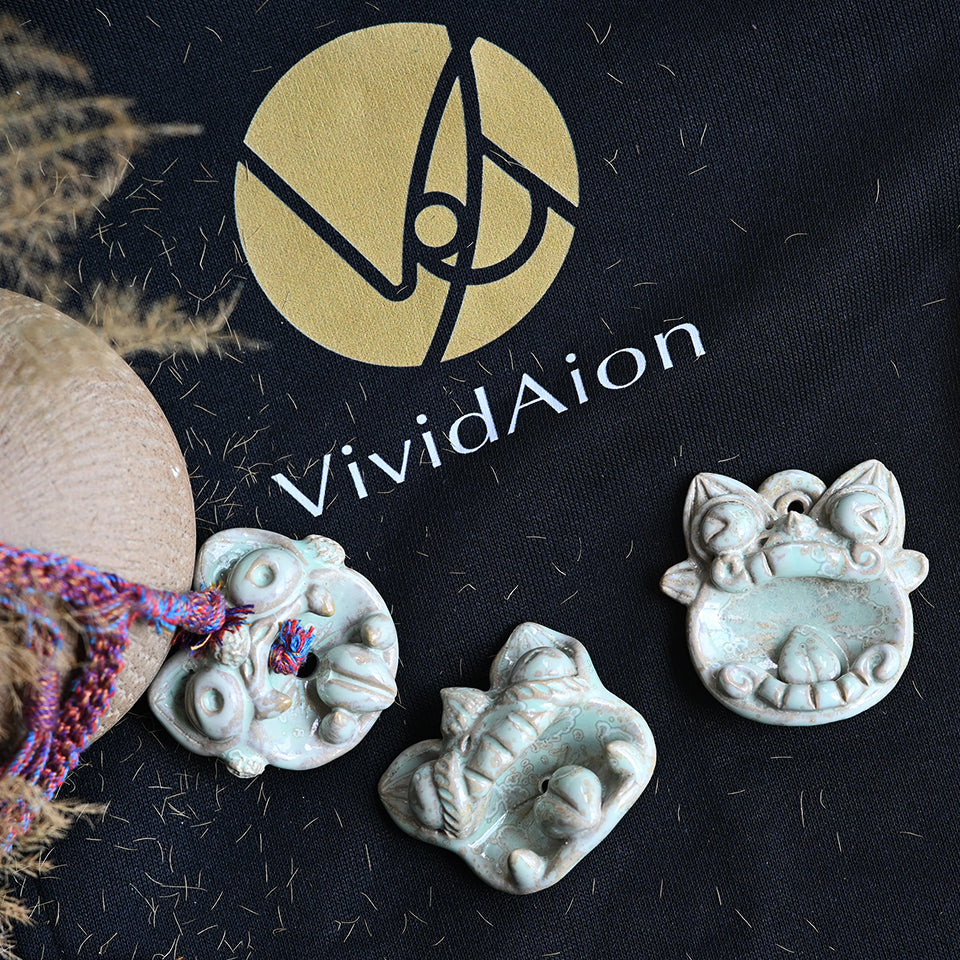 VividAion Shapes of Spirit Collection featuring handcrafted ceramic jewellery inspired by the forms and spirit of WaMao Tile Cat guardianship, blending emotional artistry with contemporary design.