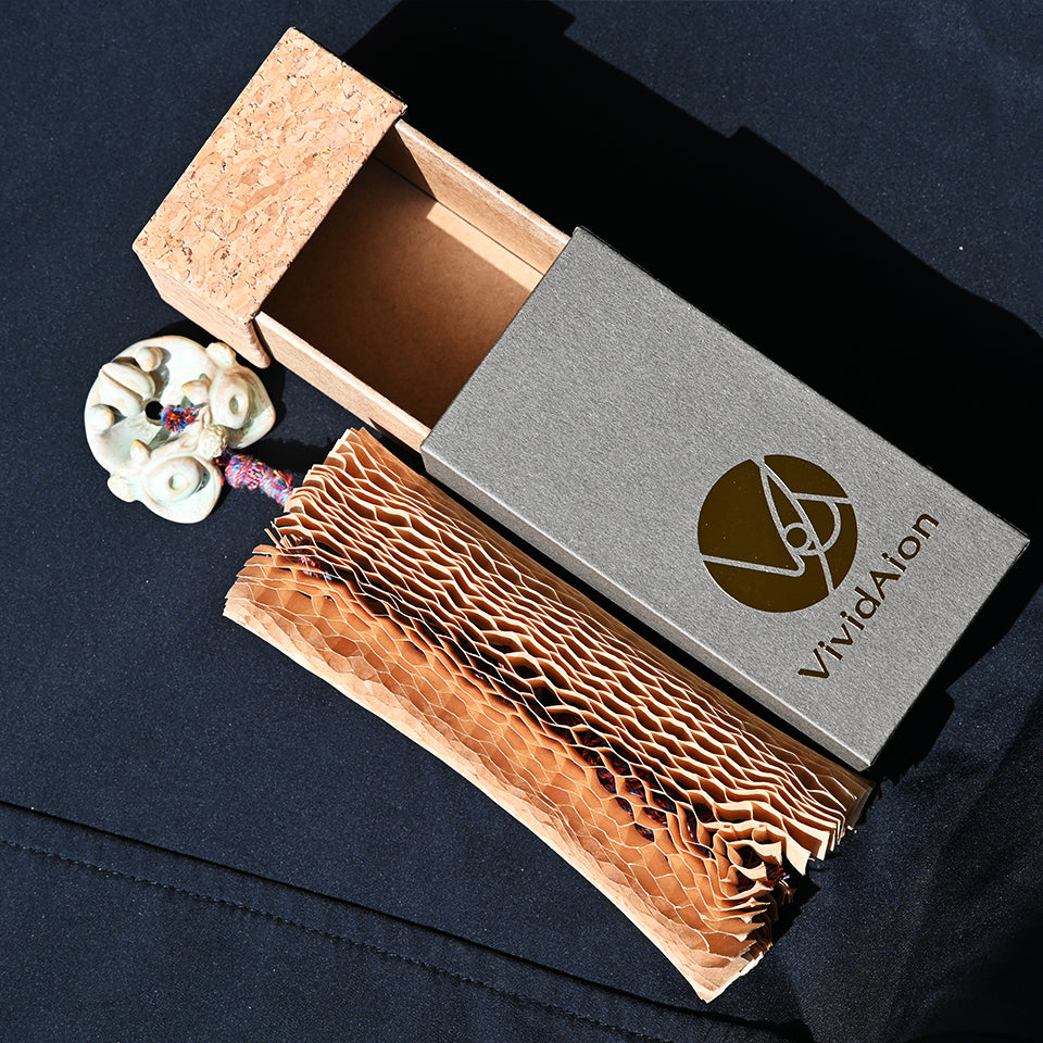 VividAion signature gift box made from eco-friendly cork and textured paper, elegant handcrafted packaging for guardian jewellery and art talismans.